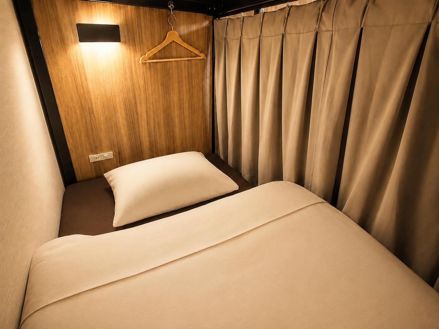 Semi-privékamer met 2 Slaapplaatsen in Stapelbedden en een Gedeelde Badkamer